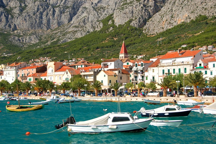 KM TRAVEL boats on restless adriatic sea in makarska, croatia