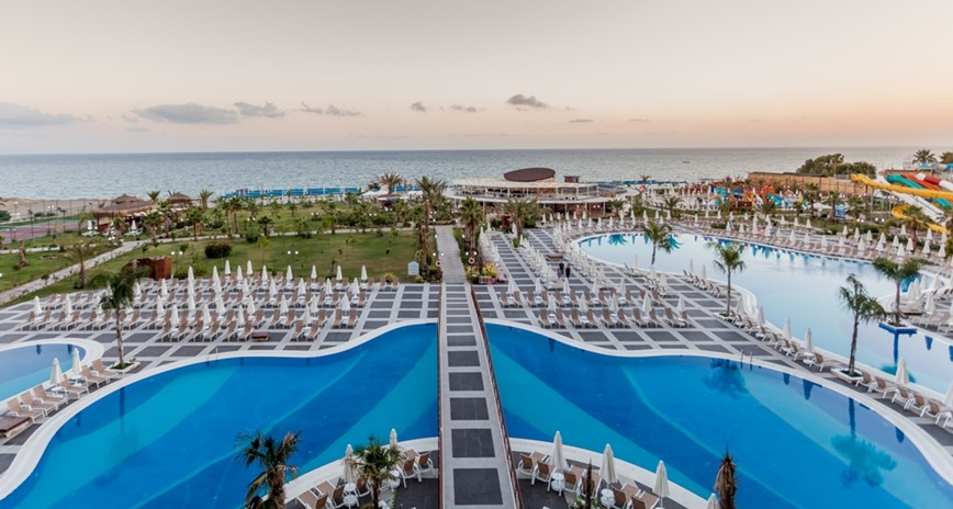 Hotel Sea Planet, bazény, pláž a moře při západu slunce, Turecko, KM TRAVEL